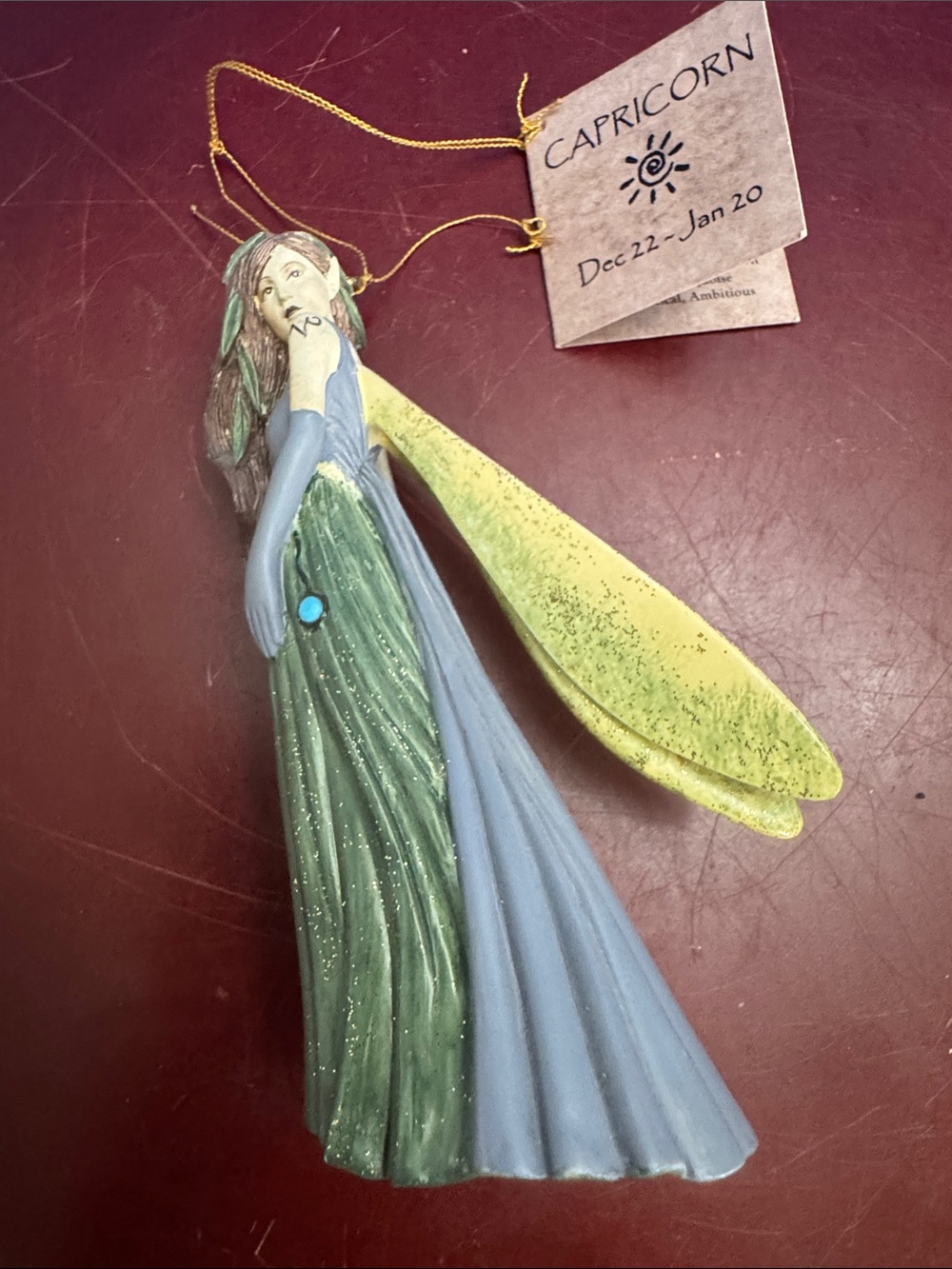 Capricorn Fairy Ornament in Green, Blue & Yellow by Jessica Galbreth